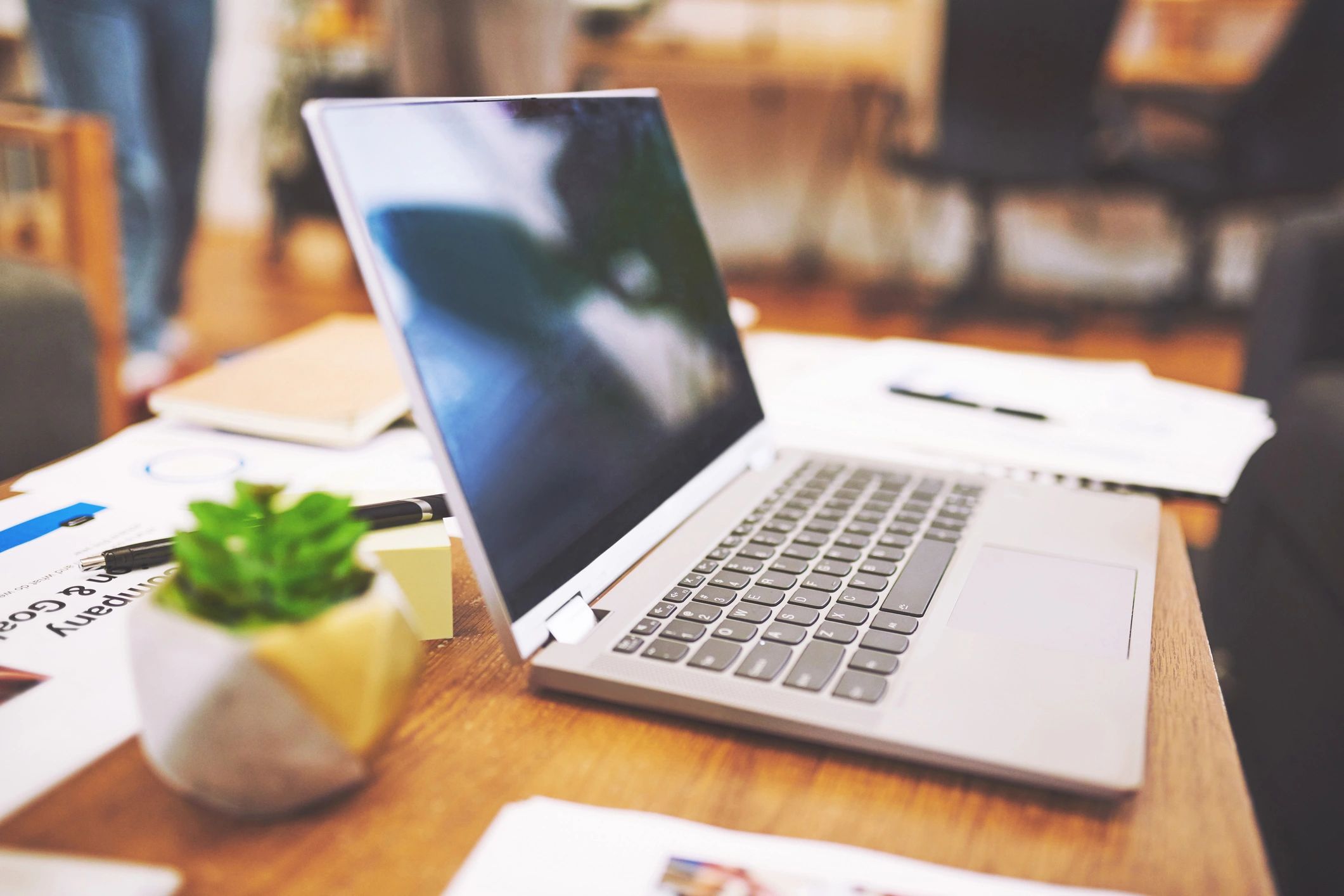 Laptop and paperwork prepared for job applications